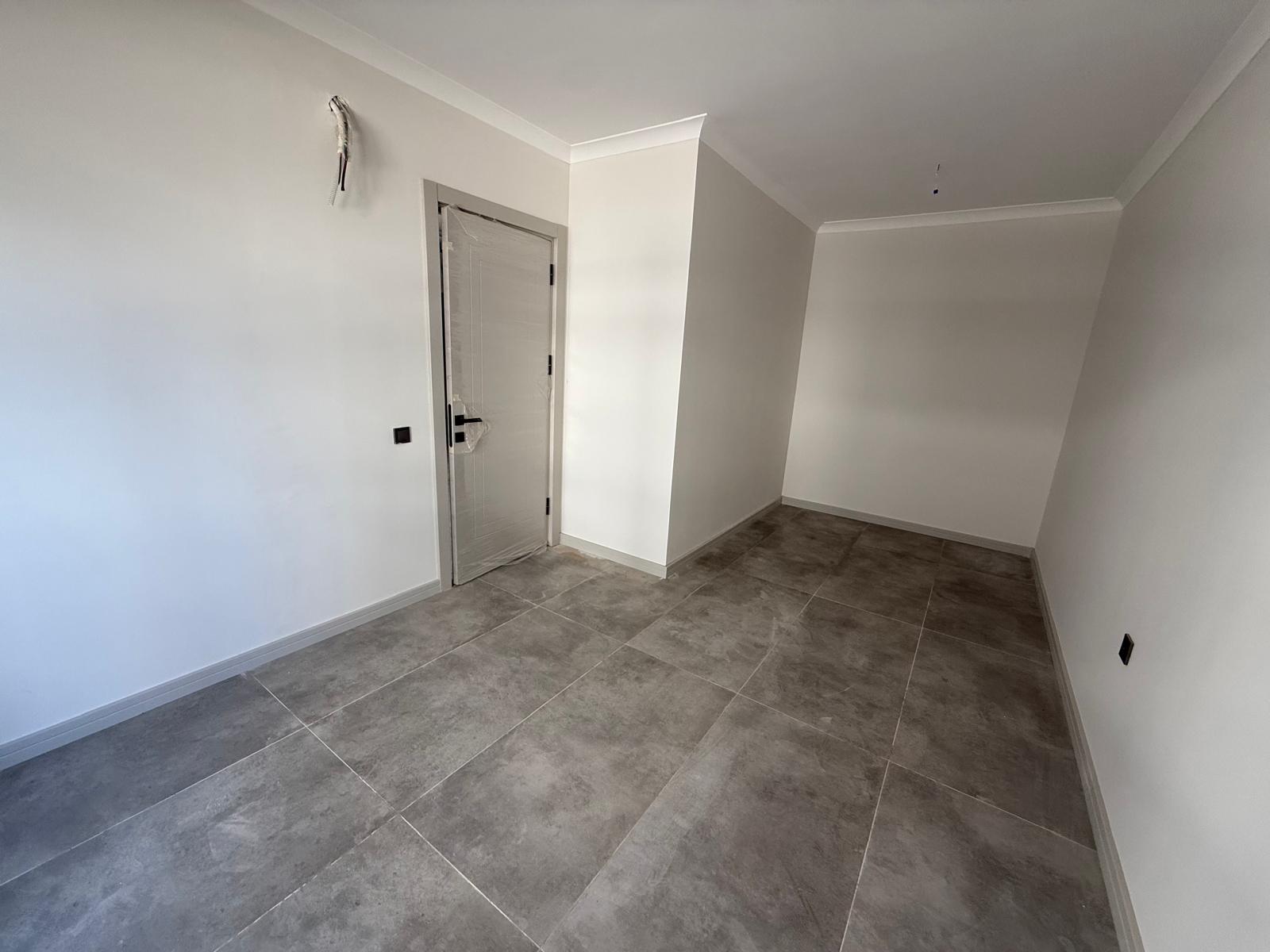 Triada Akdeniz’de Kiralık 1+1 Sıfır Daire | Havuzlu Site, Otoparklı, Güvenlikli - Resim 16