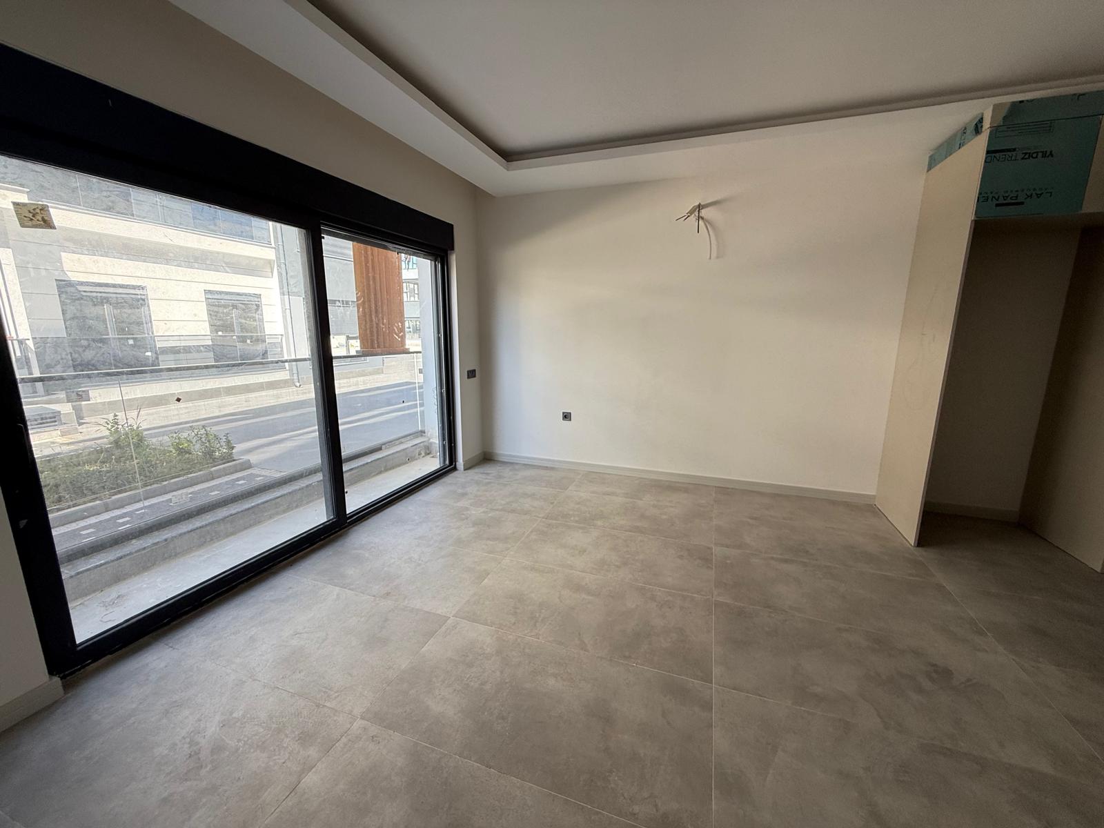 Triada Akdeniz’de Kiralık 1+1 Sıfır Daire | Havuzlu Site, Otoparklı, Güvenlikli - Resim 15
