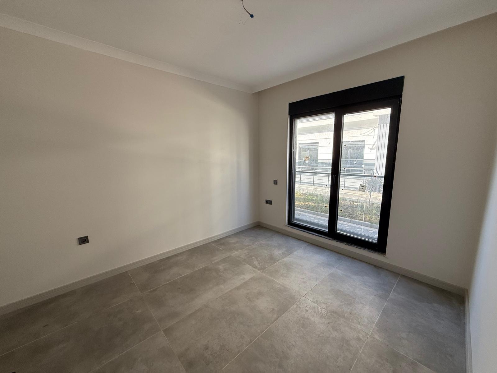 Triada Akdeniz’de Kiralık 1+1 Sıfır Daire | Havuzlu Site, Otoparklı, Güvenlikli - Resim 13